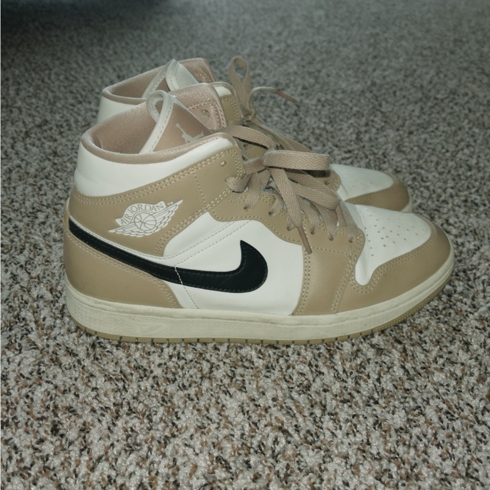 Women’s black tan and white Nike air Jordans